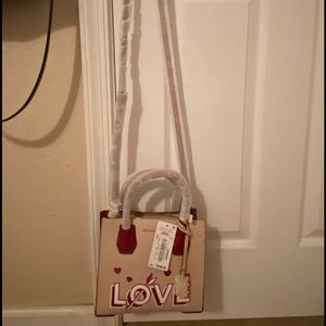 Micheal Kors cross body purse New
